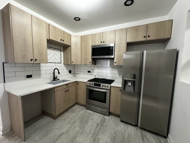 1911 South Ridgeway Avenue #1R - Photo 2 of 5