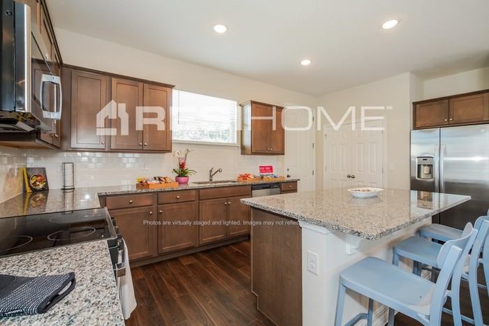 8213 Arrowwood Loop - Photo 4 of 23