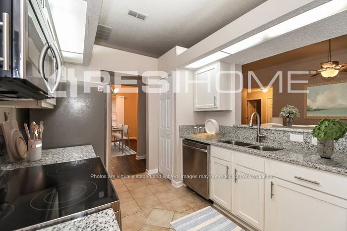 11810 Cherry Bark Dr W - Photo 2 of 18