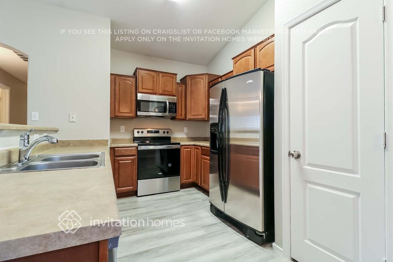 5448 S 237th Ln - Photo 3 of 15