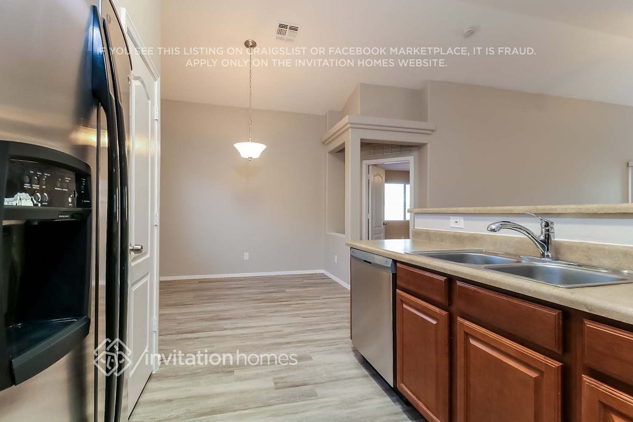 5448 S 237th Ln - Photo 4 of 15