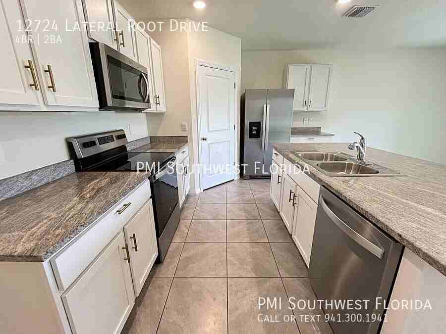 12724 Lateral Root Dr - Photo 3 of 27