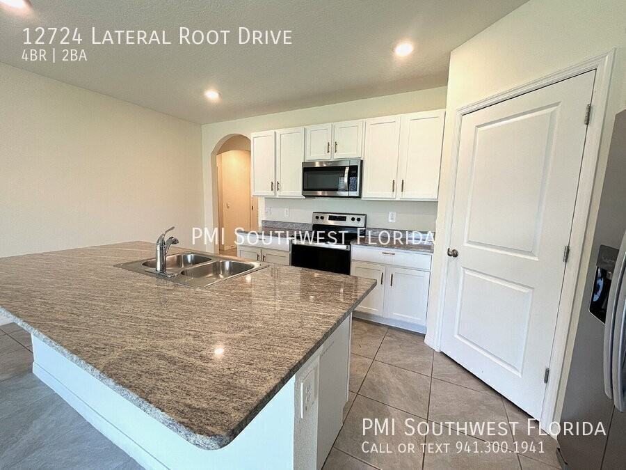12724 Lateral Root Dr - Photo 4 of 27