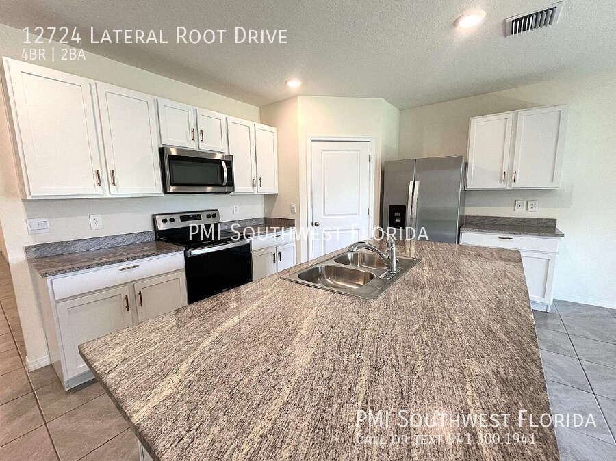 12724 Lateral Root Dr - Photo 5 of 27