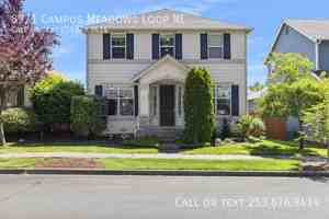 featured image of 8971 Campus Meadows Loop Ne