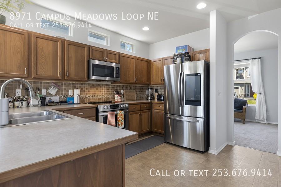 8971 Campus Meadows Loop Ne - Photo 2 of 29