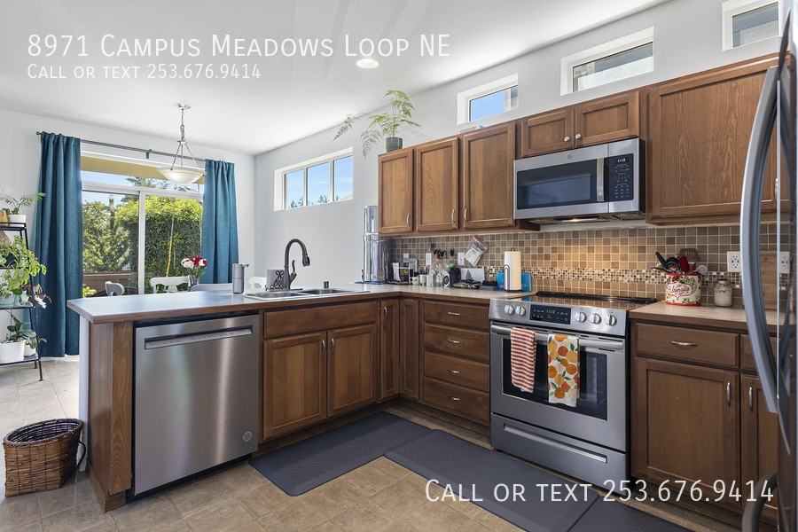 8971 Campus Meadows Loop Ne - Photo 3 of 29