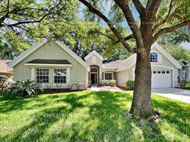 featured image of 1402 Whispering Woods Way