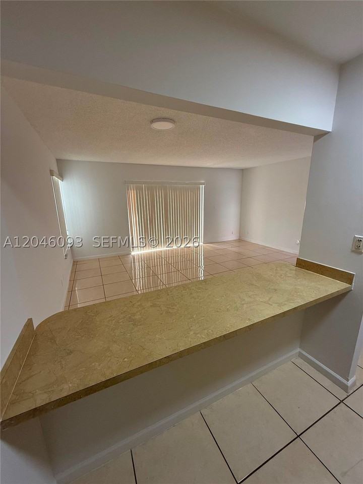 455 S Pine Island Rd #306C - Photo 2 of 16