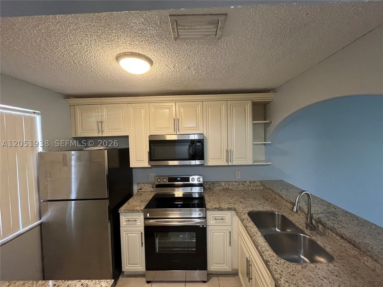 2740 Forest Hills Blvd #202 - Photo 5 of 25