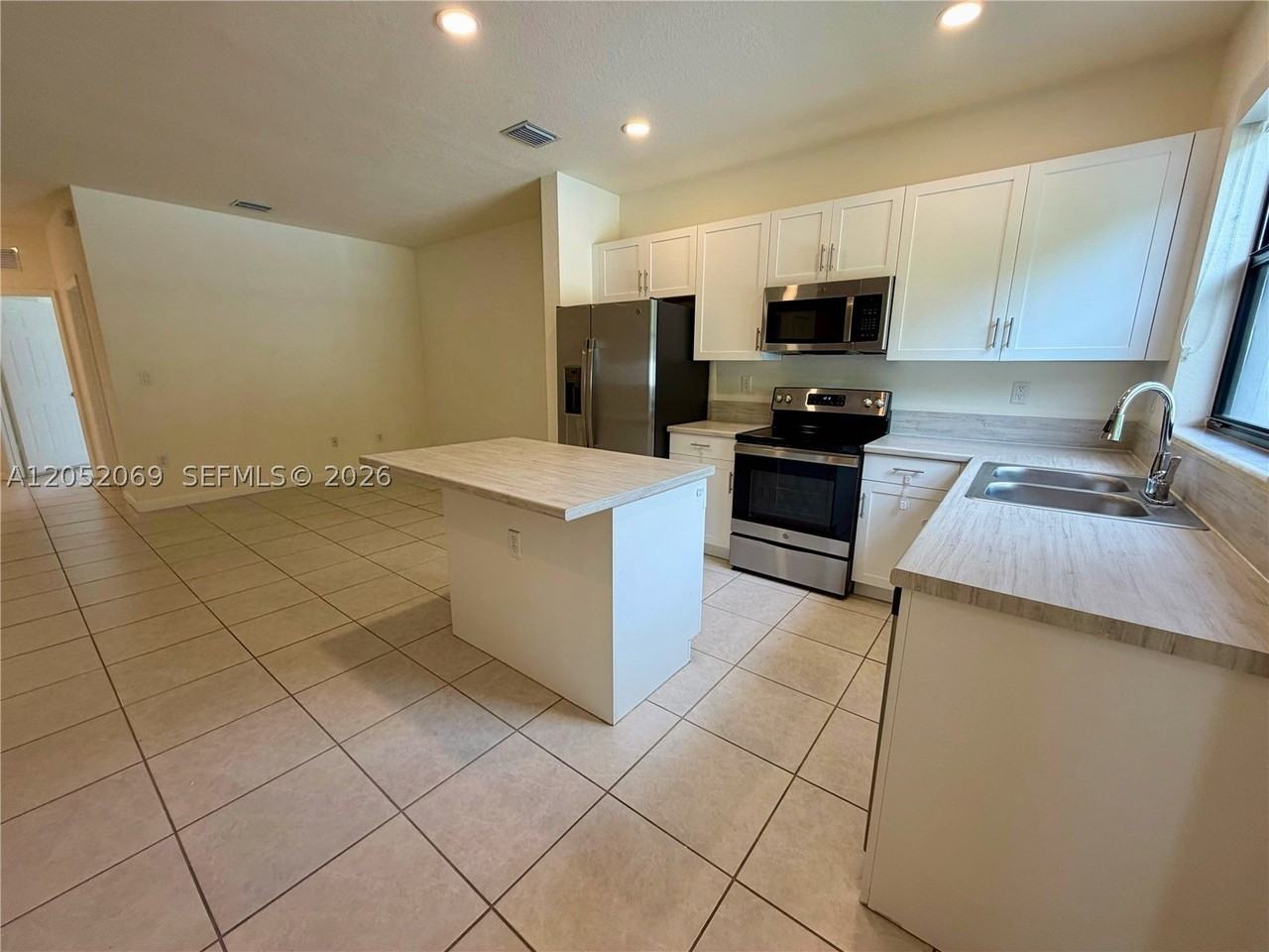 11115 W 32nd Ln - Photo 3 of 19
