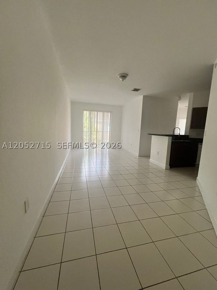 7200 Nw 177th St #206-7 - Photo 6 of 10