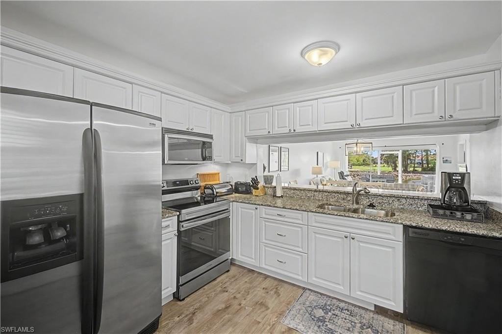 7065 Dennis Cir #F103 - Photo 4 of 32