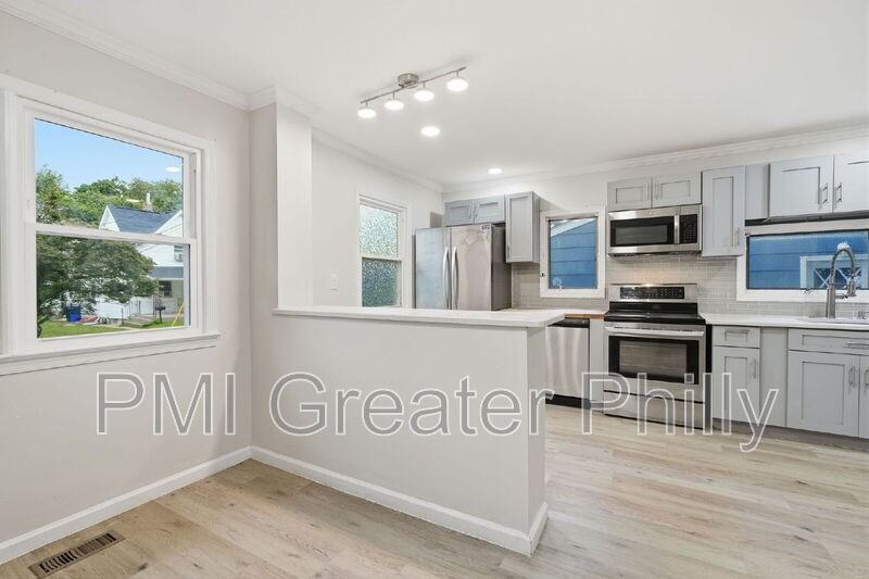 1523 W Cheltenham Ave - Photo 7 of 34
