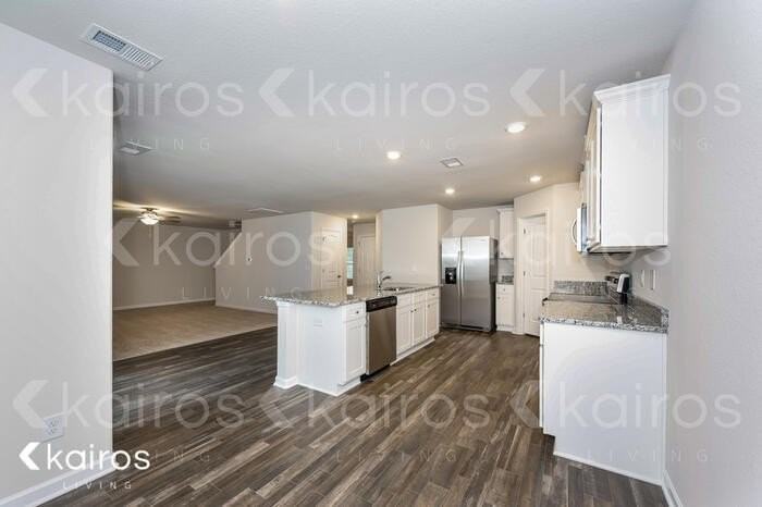 607 Wild Tulip Ct - Photo 5 of 16