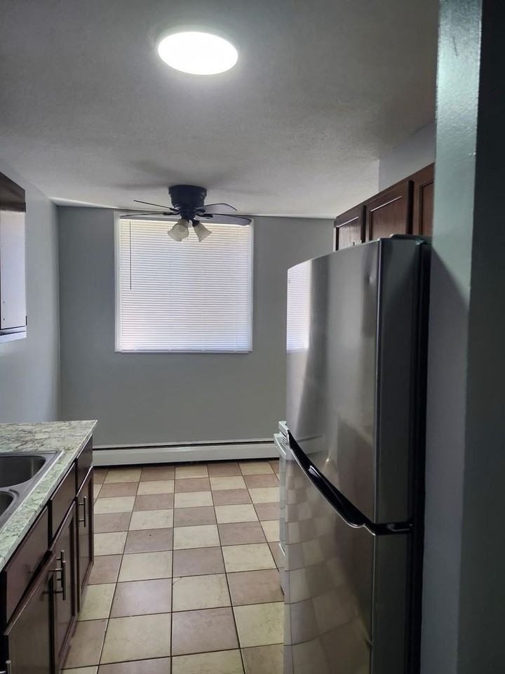 Village Green Apartment - Photo 6 of 7