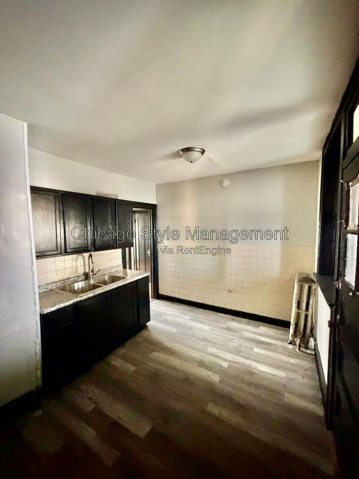 2950 W 61st St #2 - Photo 3 of 7