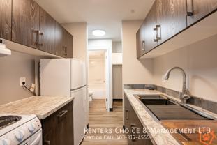210 103-210 Mayor Magrath Dr N - Photo 1 of 1