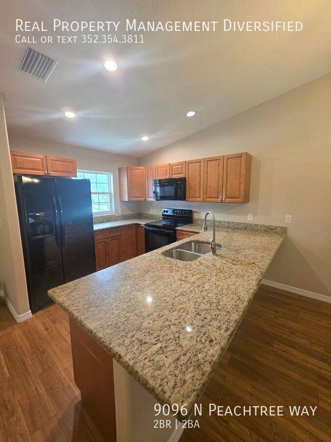 9096 N Peachtree Way - Photo 3 of 25