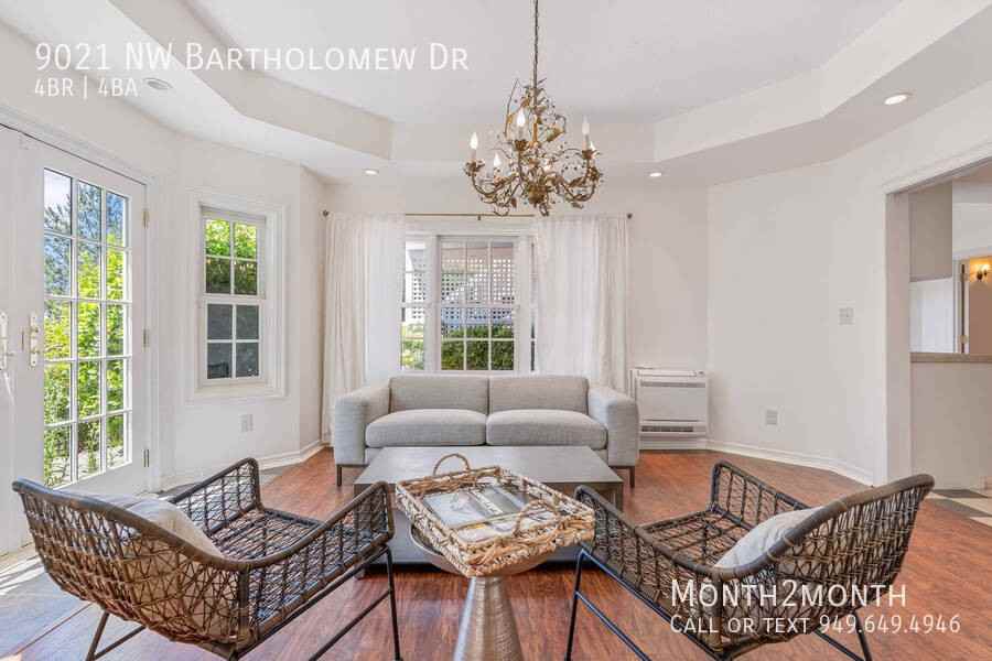 9021 Nw Bartholomew Dr - Photo 2 of 48