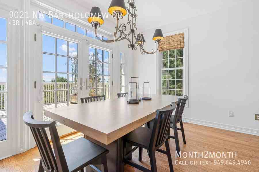 9021 Nw Bartholomew Dr - Photo 3 of 48