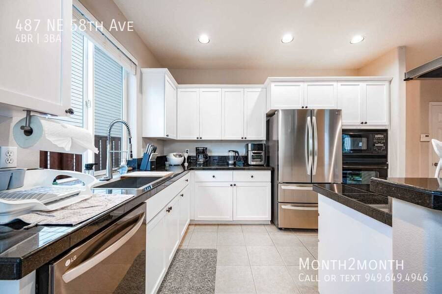 487 Ne 58th Ave - Photo 7 of 26