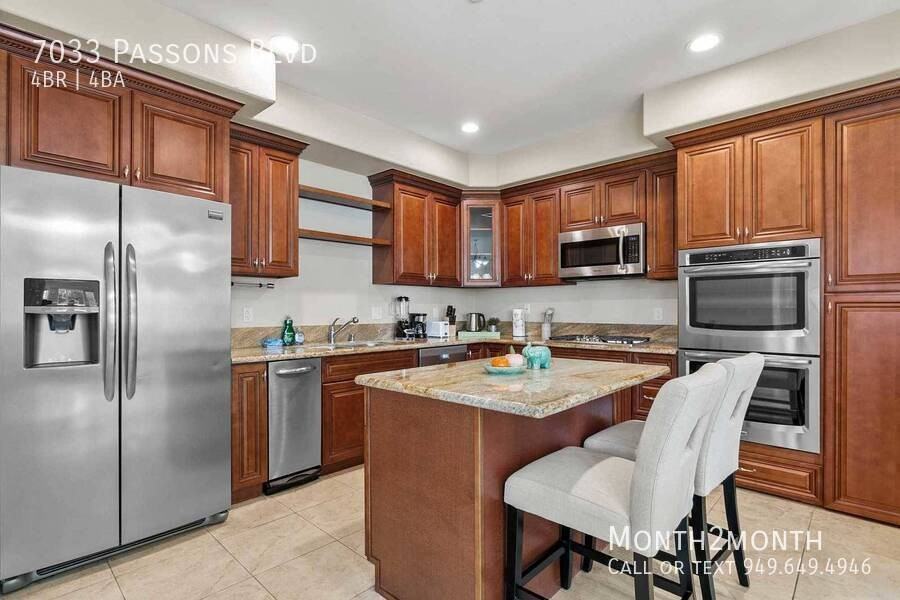 7033 Passons Blvd - Photo 5 of 30