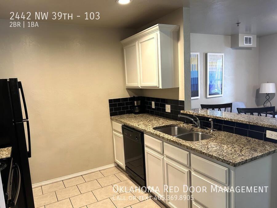 2442 Nw 39th St #103 - Photo 2 of 13