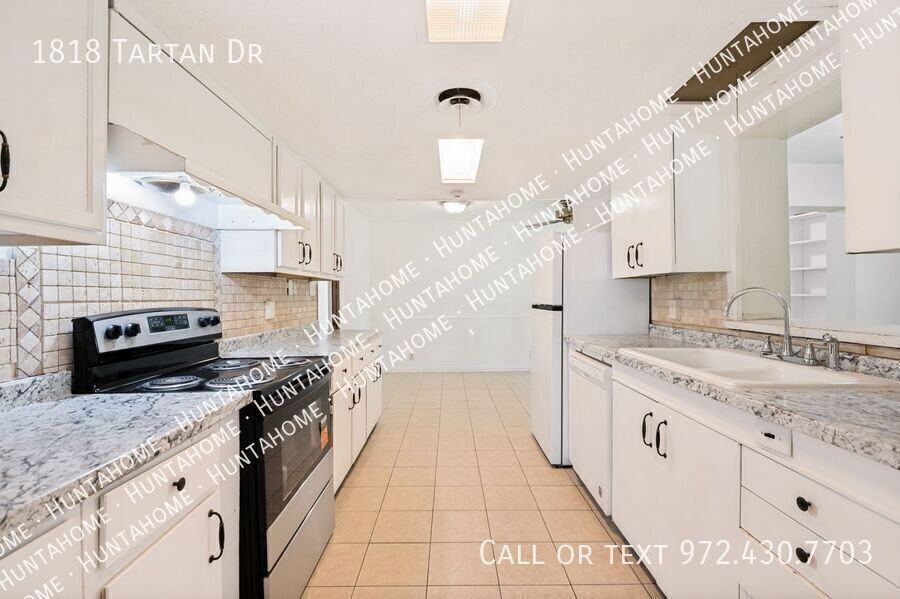 1818 Tartan Dr - Photo 4 of 12