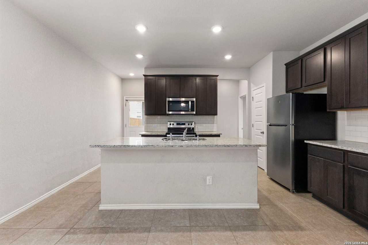 10019 Rancho Real Rd - Photo 6 of 17