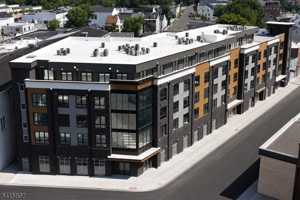 featured image of 587 River St #210