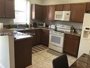 11380 Sw 233rd St - Photo 3 of 7