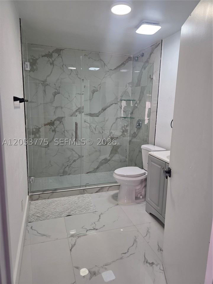 8830 Nw 150th St - Photo 4 of 7