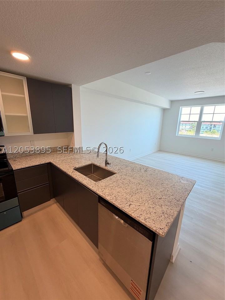 5563 Millenia Park Blvd #310 - Photo 3 of 15