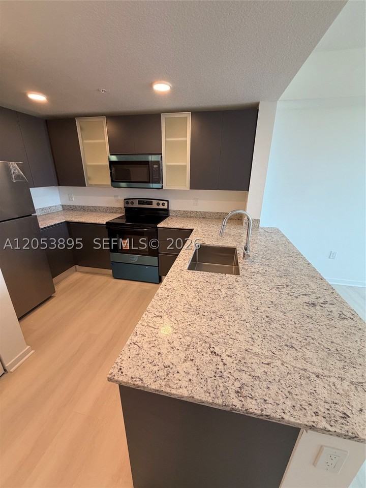 5563 Millenia Park Blvd #310 - Photo 4 of 15