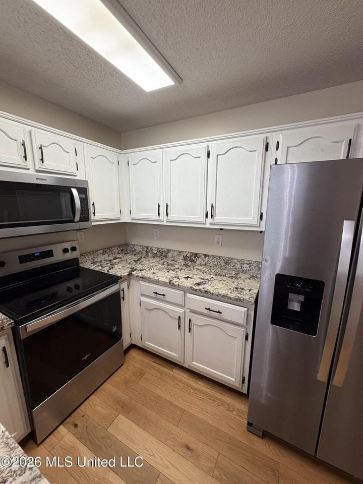 7632 Tally Ho Dr E - Photo 5 of 14