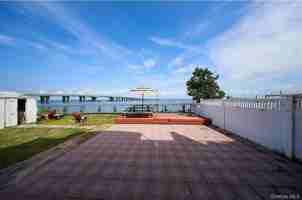 featured image of 8918 Beach Channel Dr