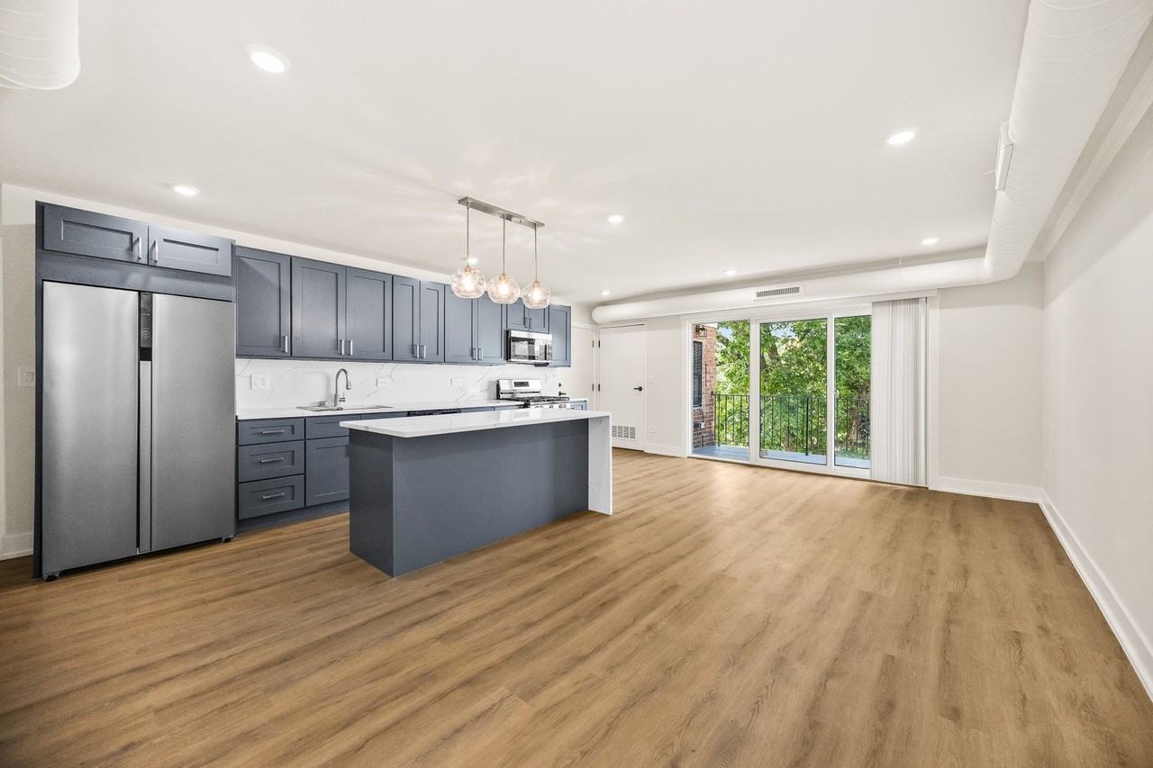 10217 Dearlove Rd #301 - Photo 3 of 16