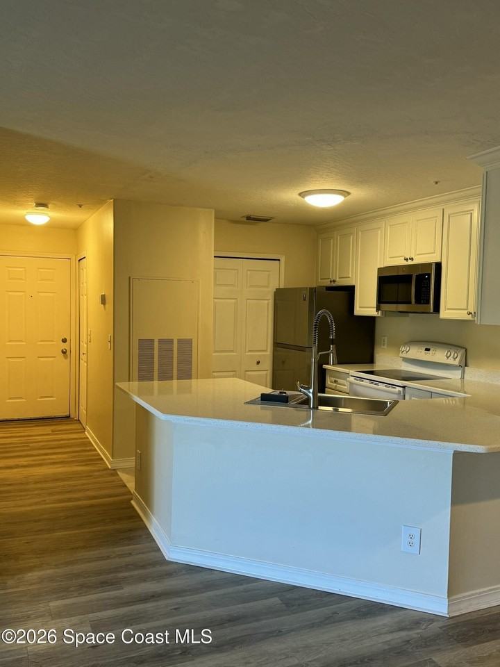 7667 N Wickham Rd #710 - Photo 5 of 14