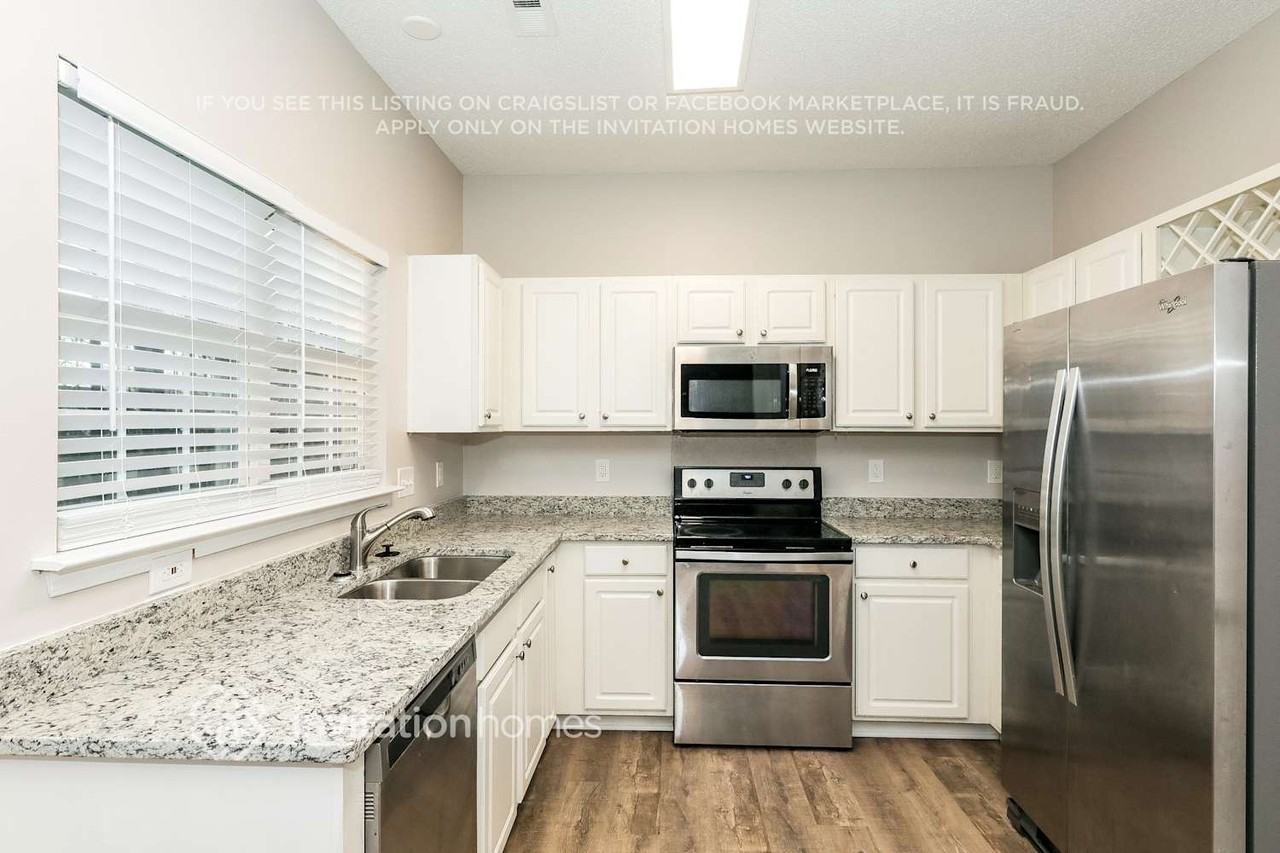 7140 Duchamp Dr - Photo 6 of 16