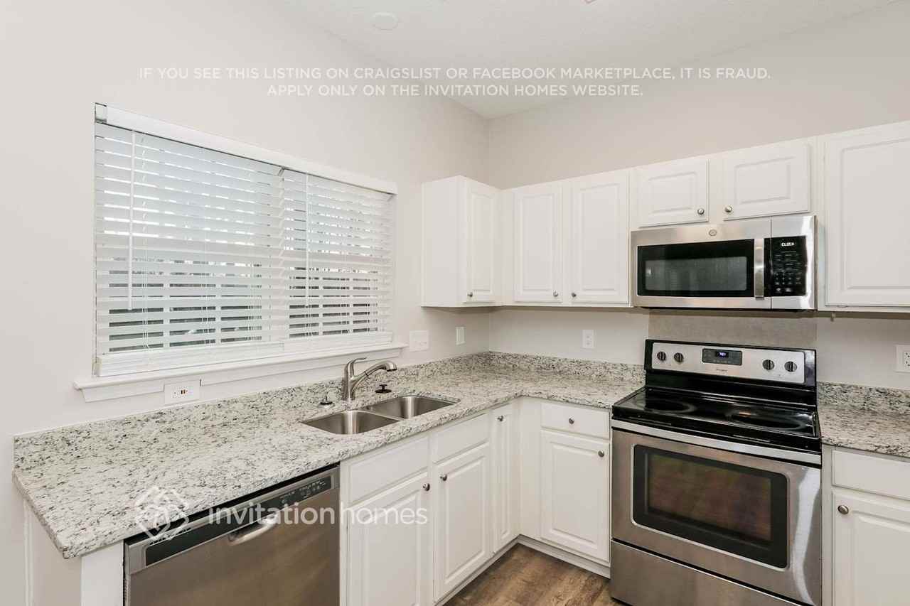 7140 Duchamp Dr - Photo 7 of 16