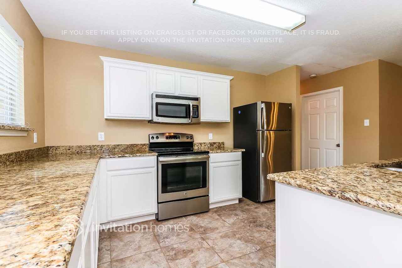 8115 Colwick Ln - Photo 7 of 25