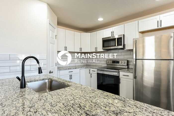 18654 E 46th Pl - Photo 7 of 17