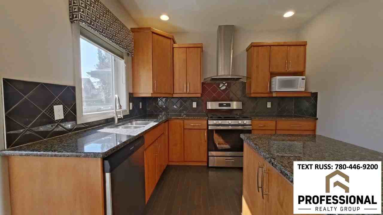 6162 Maynard Cres Nw - Photo 7 of 24