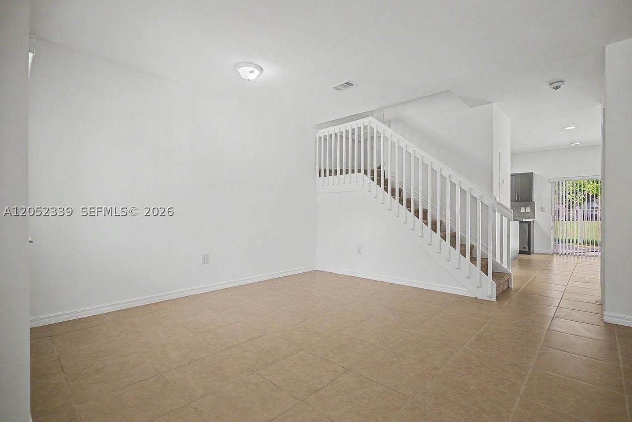 1668 Se 30th St #1 - Photo 3 of 23