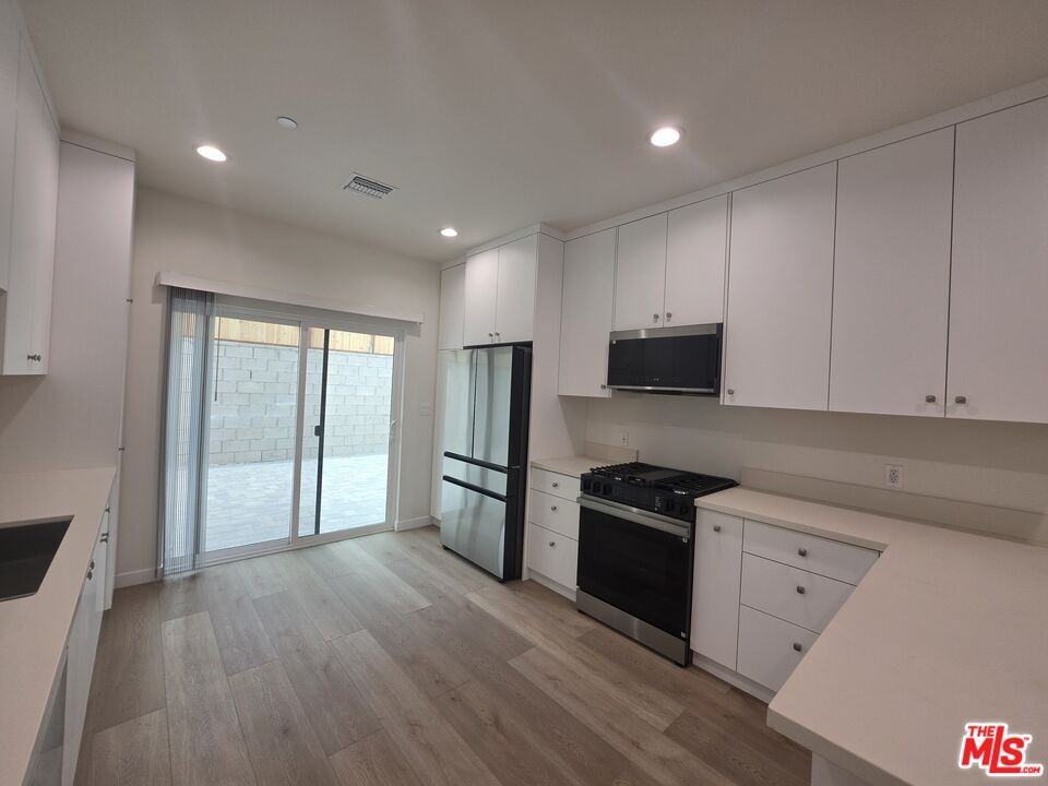 6748 Ben Ave - Photo 4 of 5