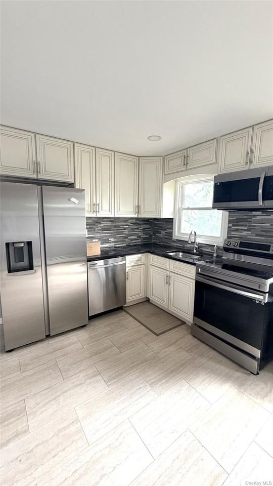 200 Hicksville Rd #2ndFL - Photo 3 of 5