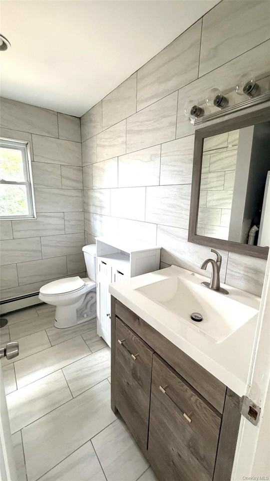200 Hicksville Rd #2ndFL - Photo 5 of 5