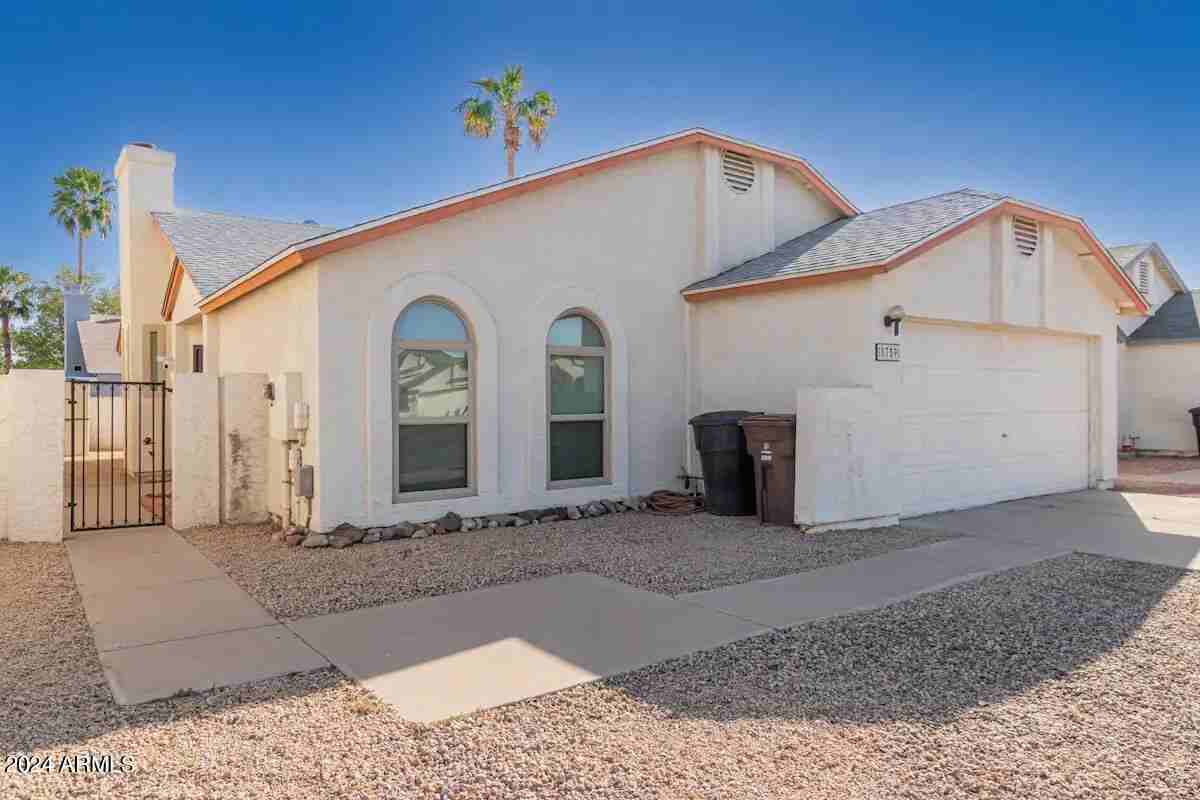 8759 W Grovers Ave - Photo 3 of 26