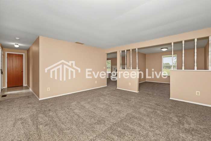 6130 Honeygate Dr - Photo 3 of 15
